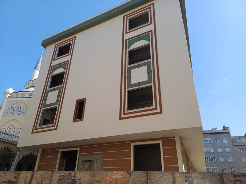 Köşe yapı · cephe ve iç mekânlar — 18